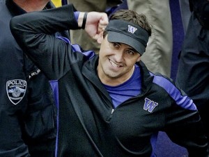 Washington coach Steve Sarkisian cheers following his team's 16-13 upset victory over Southern California, Saturday, Sept. 19, 2009, in an NCAA college football game in Seattle. (AP Photo/The News Tribune, Drew Perine)   Original Filename: APTPOPIX_USC_Washington_Football_WATAC103.jpg